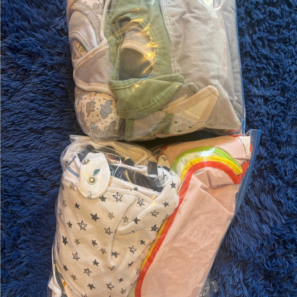 Star and Rainbow Baby Boy Bibs. Mix of 50 small-large.